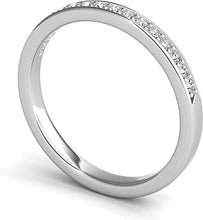 A single line of round brilliant cut diamonds are pave-set and go h...
