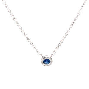 This minimalist and dainty necklace features a center sapphire tota...
