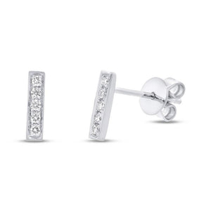 These diamond bar earrings feature pave set round brilliant cut dia...