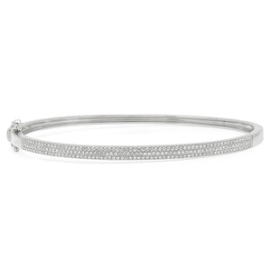 This bangle features pave set round brilliant cut diamonds that tot...