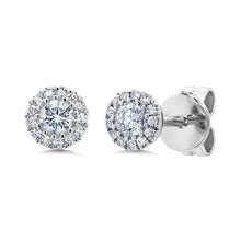 These stud earrings feature round brilliant cut diamonds that total...