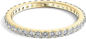 A stylish low-profile design featuring round brilliant cut diamonds...