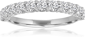 This diamond wedding band from our Signature Collection features pr...