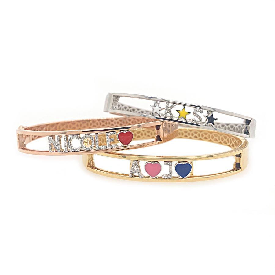 This bangle features your choice of letters, enamel hearts, and sta...