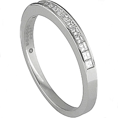 This Jeff Cooper wedding band is channel set with asscher cut diamo...