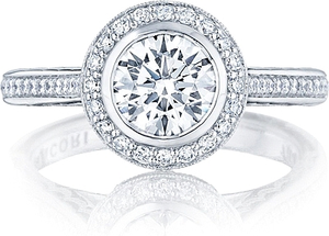 The round center diamond of your choice blooms in a starlit crown a...