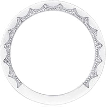 This diamond band features pave set round brilliant cut diamonds th...