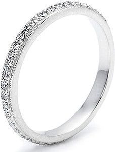 Straight pave diamond eternity band, pictured with hand-set round p...