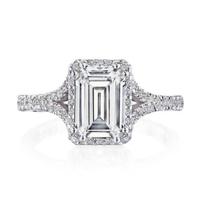 This stunning engagement ring setting is hand made by Tacori and fe...