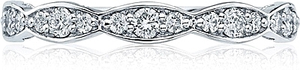 Beautiful marquise shapes give this eternity band a ribbon-like flo...