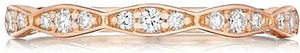 Beautiful marquise shapes give this eternity band a ribbon-like flo...