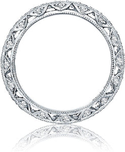 The founding Crescent Silhouette design, pictured with round diamon...