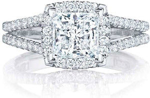 The brilliant round diamonds in the bloom of the center diamond mak...