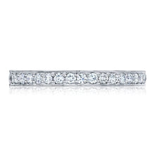 Straight pave-set diamond wedding band, pictured with round brillia...