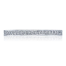 Straight pave-set diamond wedding band, pictured with round brillia...