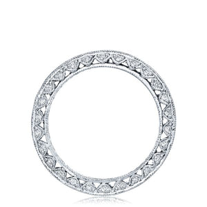 The platinum and diamond eternity band is pictured with square emer...