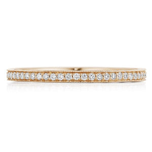 This diamond band features pave set round brilliant cut diamonds th...