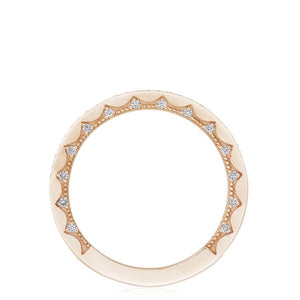 This diamond band features pave set round brilliant cut diamonds th...