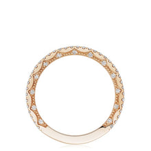 This band from Tacori features pave set round brilliant cut diamond...