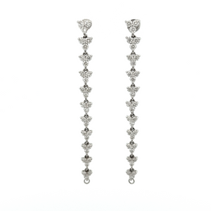 These earrings can be converted into hoops and feature diamonds tot...