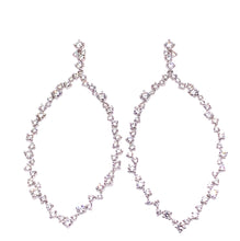 These earrings feature diamonds totaling to 2.36cts.