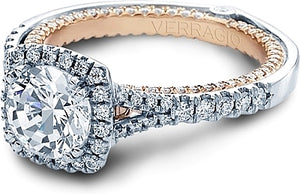 This engagement ring from the Couture Collection, featuring 0.70Ct....
