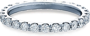 This diamond eternity ring by Verragio features round brilliant cut...