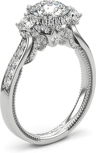 This diamond engagement ring setting features round brilliant cut d...
