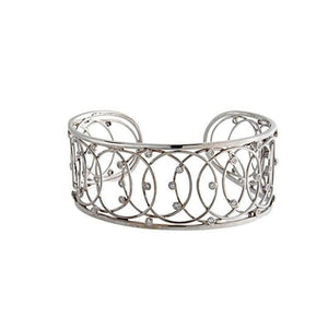 This cuff bracelet has bezel set round brilliant cut diamonds that ...