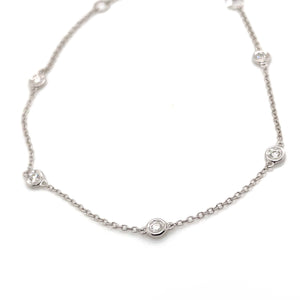 This dainty bracelet features diamonds totaling .13ct and is availa...