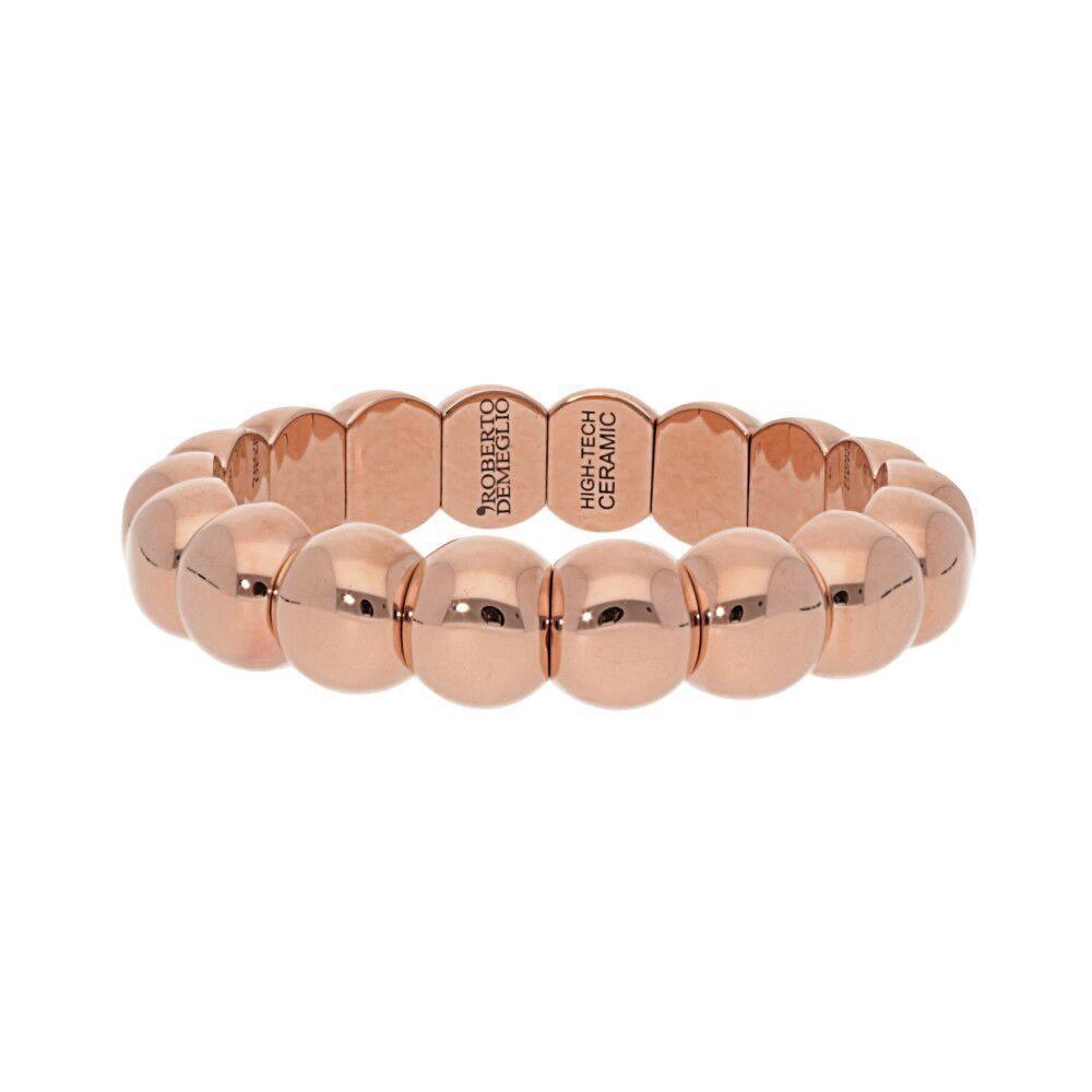 This bracelet features ceramic beads with an 18k rose gold finish o...