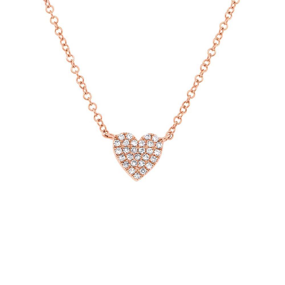 This necklace features a pave heart in the center that totals .09cts.