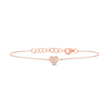 This bracelet features a pave heart in the center with .04cts of ro...