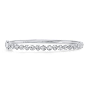 This bracelet features round brilliant cut diamonds that total 1.35...