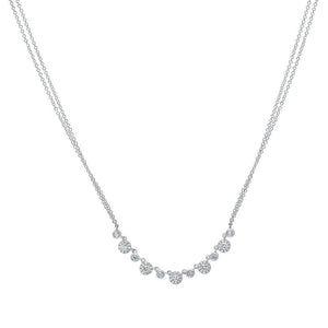 This necklace features round brilliant cut diamonds that total .56cts.