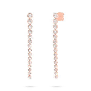 These earrings feature round brilliant cut diamonds that total 1.64...